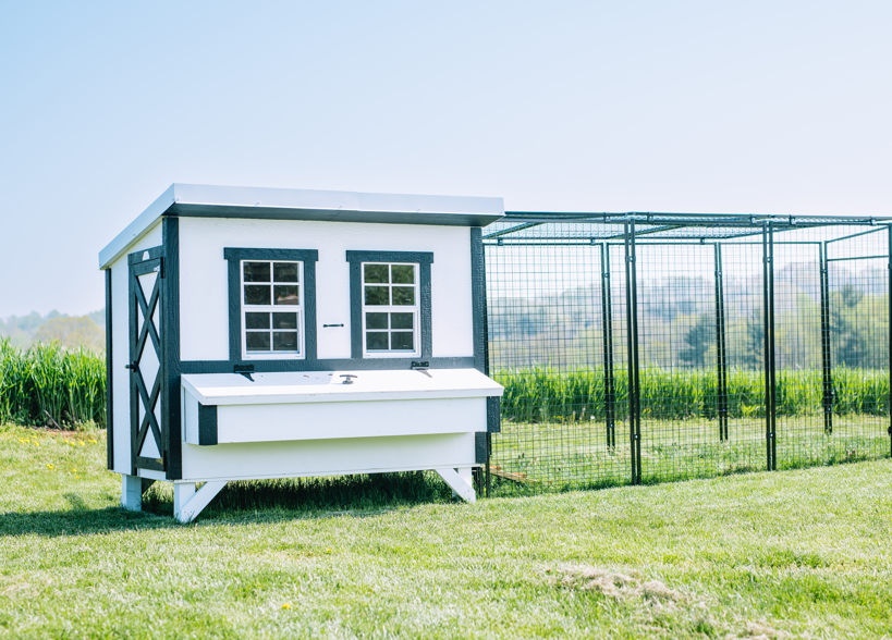 Large OverEZ Chicken Coop designed for up to 15 chickens, featuring durable construction and spacious outdoor shelter.