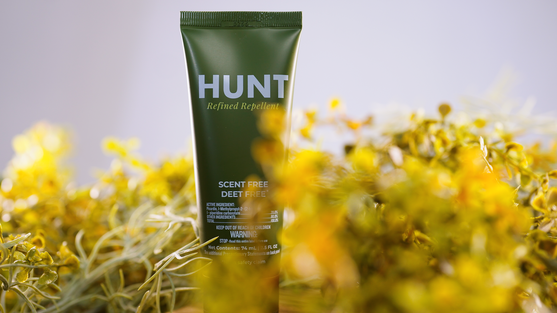 Hunt scent-free, DEET-free insect repellent lotion bottle with pump dispenser, designed for outdoor protection against insects.