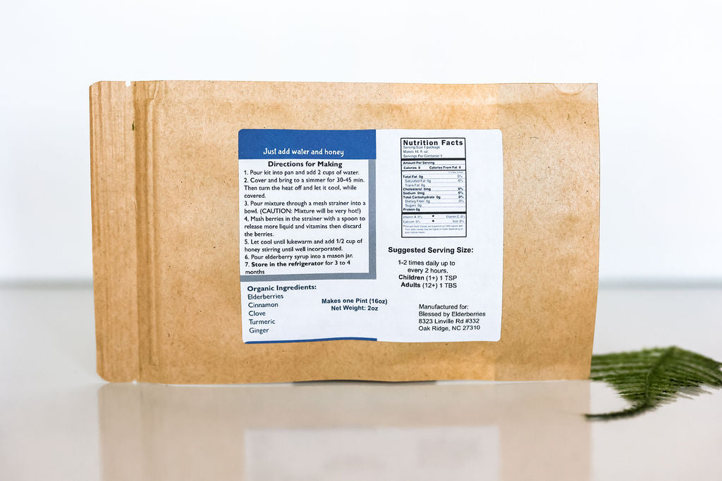 DIY pint-sized elderberry syrup kit by Blessed by Elderberries in a clear bag with ingredients ready for brewing.