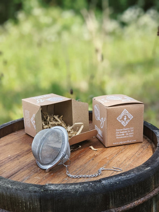 Piper Tea Ball brewing device by Piper and Leaf Tea Co. for steeping loose tea leaves in hot water.