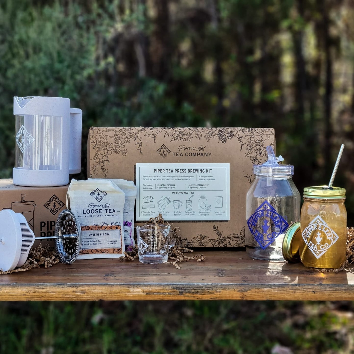 Piper Press Brew Kit from Piper and Leaf Tea Co., featuring a classic design for brewing tea, displayed on a front porch.