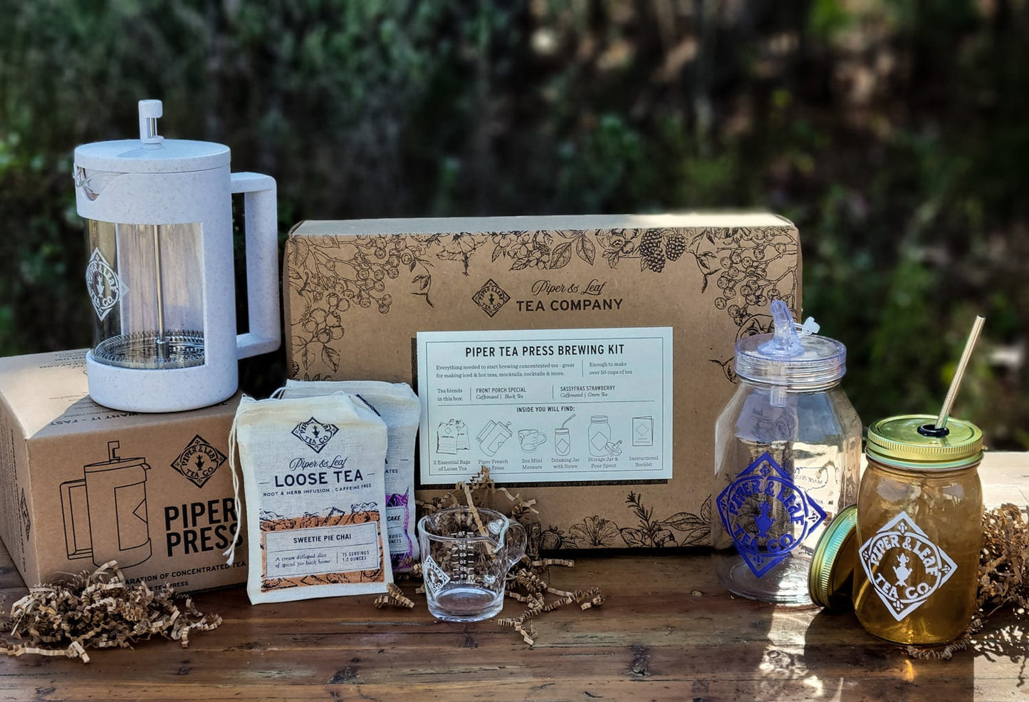 Piper Press Brew Kit by Piper and Leaf Tea Co. featuring a classic design for brewing tea, with a strawberry-themed gift set.