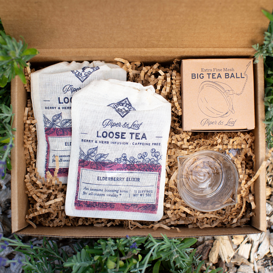 Elderberry Syrup Starter Brewing Kit from Piper and Leaf Tea Co. gift set, includes jars, strainer, and ingredients for homemade elderberry syrup.