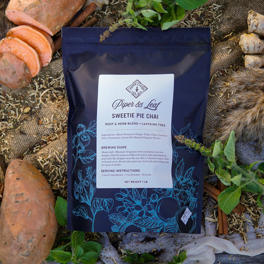 Sweetie Pie Chai loose tea from Piper and Leaf Tea Co. in a pound bag, showing the textured tea leaves and packaging.