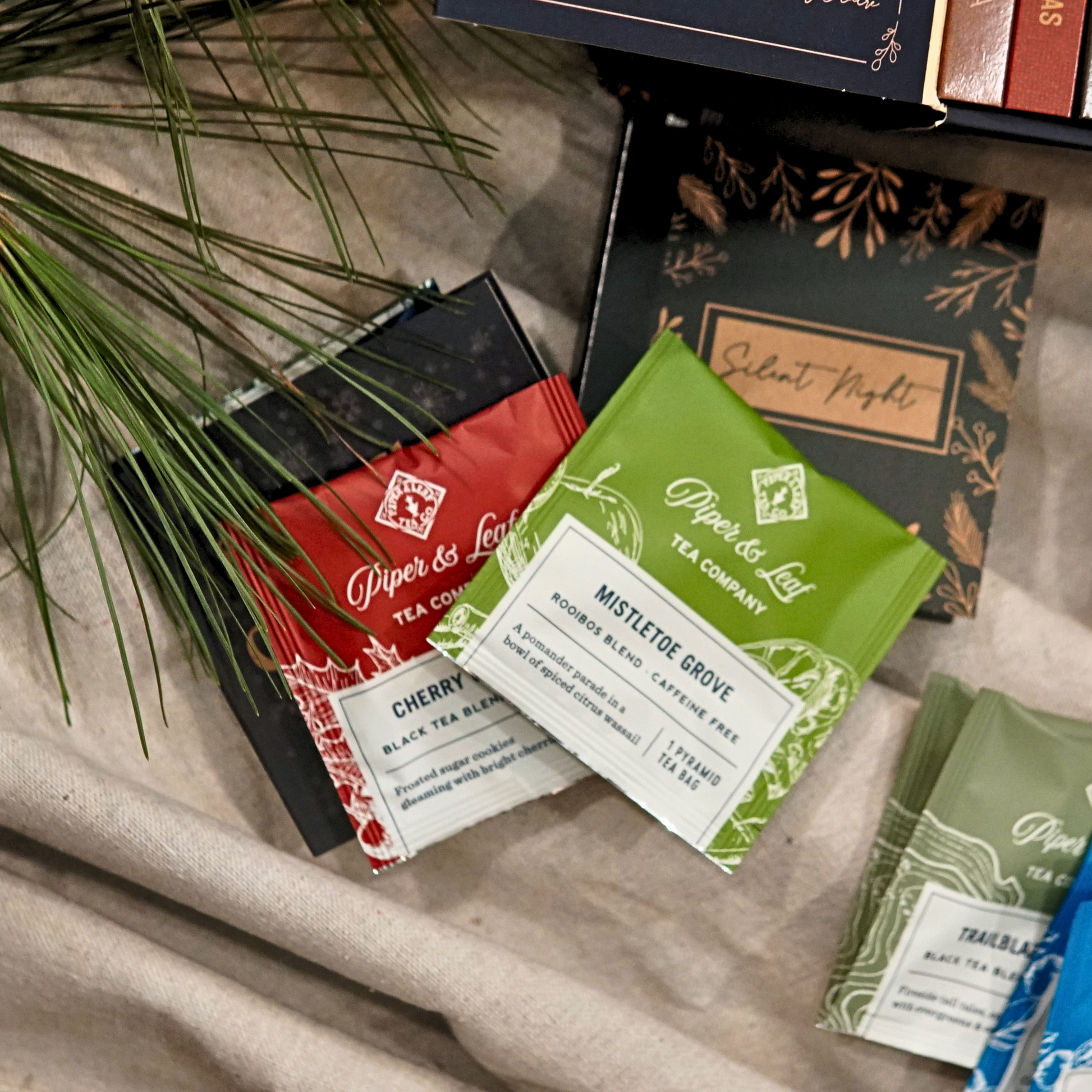 Assorted Piper and Leaf Tea Co. tea bags in a refill kit for advent calendars, featuring colorful packaging and variety of flavors.