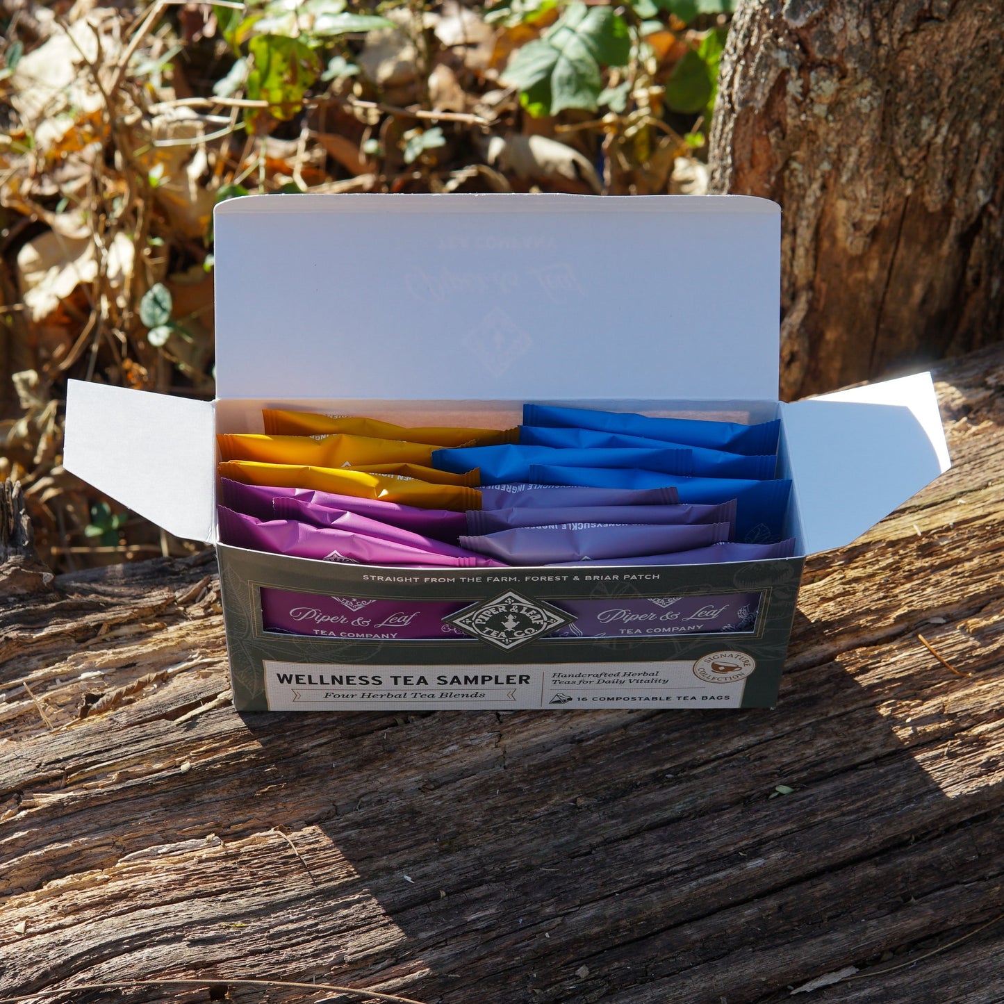Piper and Leaf Tea Co. Wellness Tea Sampler box with 16 assorted tea bags, featuring herbal and wellness blend teas.