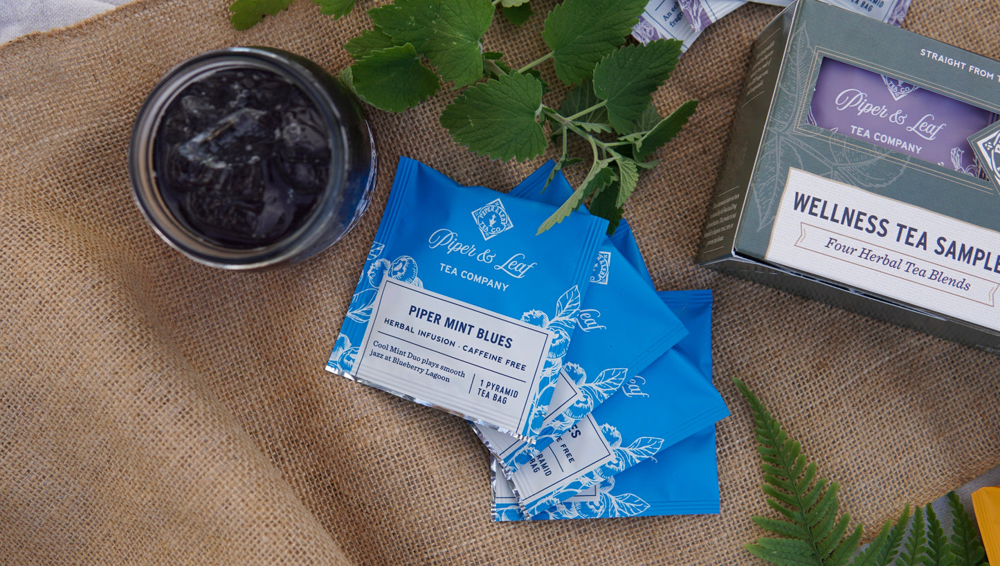 Piper and Leaf Tea Co. Wellness Tea Sampler box with 16 assorted tea bags, featuring herbal and wellness tea blends.