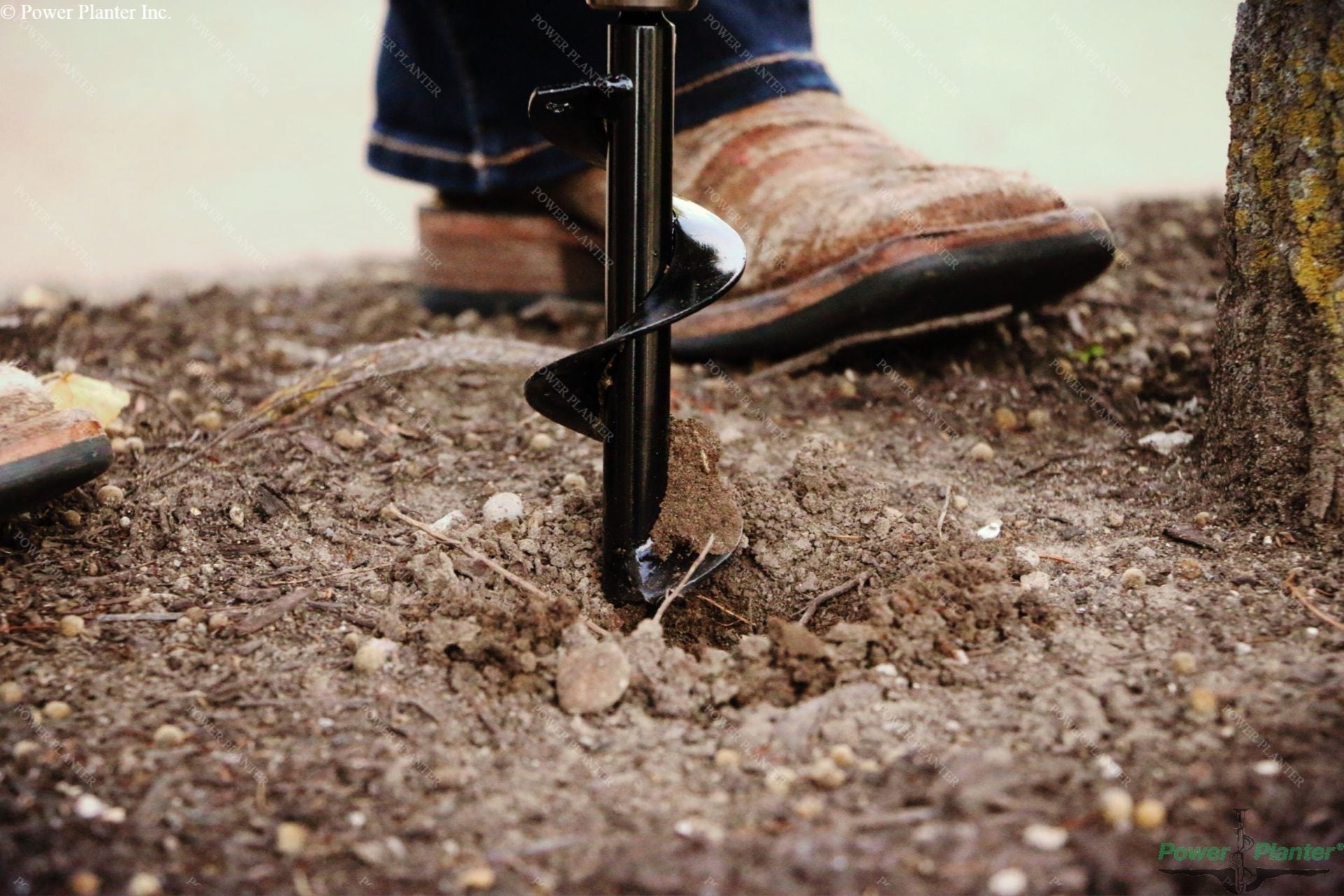 Power Planter Augers gardening auger with a 2-inch by 7-inch size for planting flowers and grass plugs in soil.