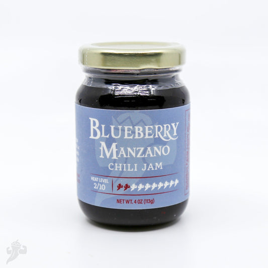 Blueberry Manzano Chili Jam by Powerful Pepper Company, showcasing vibrant blueberry and chili spread in a jar.