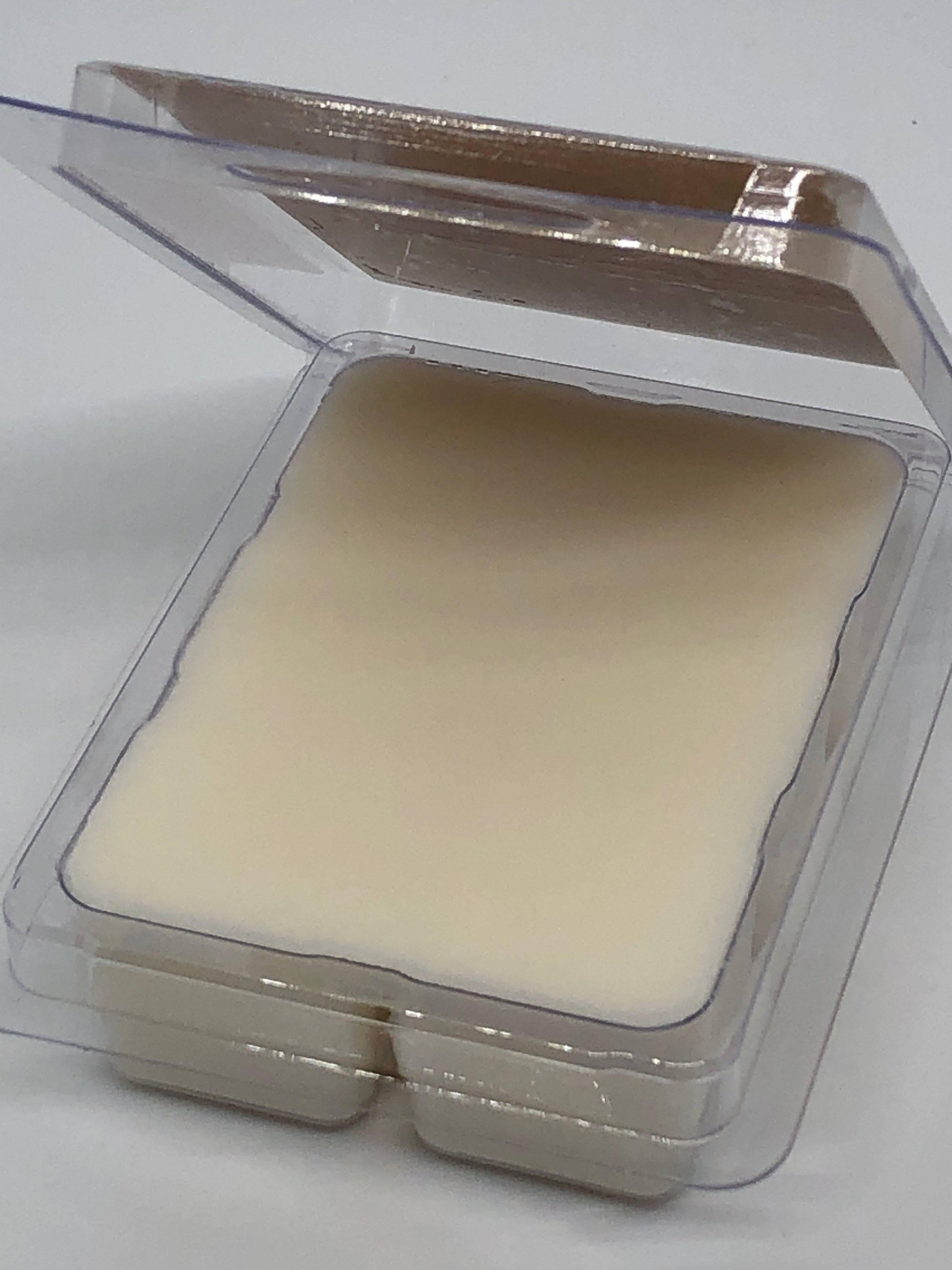 Vegan soy wax melts and candles from Prairie Fire Tallow, featuring blue and lavender colors with small-batch craftsmanship.