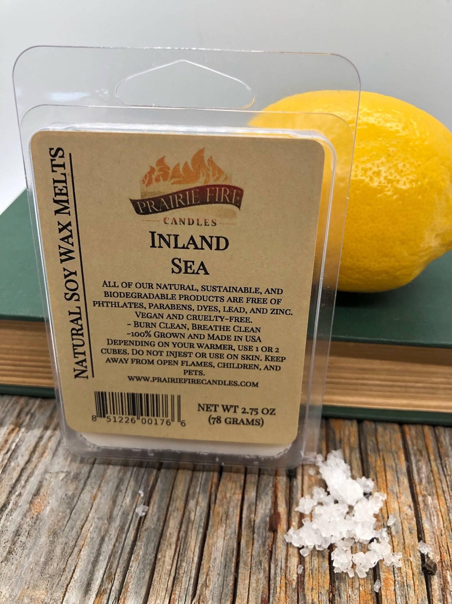 Vegan soy wax melts and wax cubes from Prairie Fire Tallow, featuring wickless candles with lavender and blue stem accents.