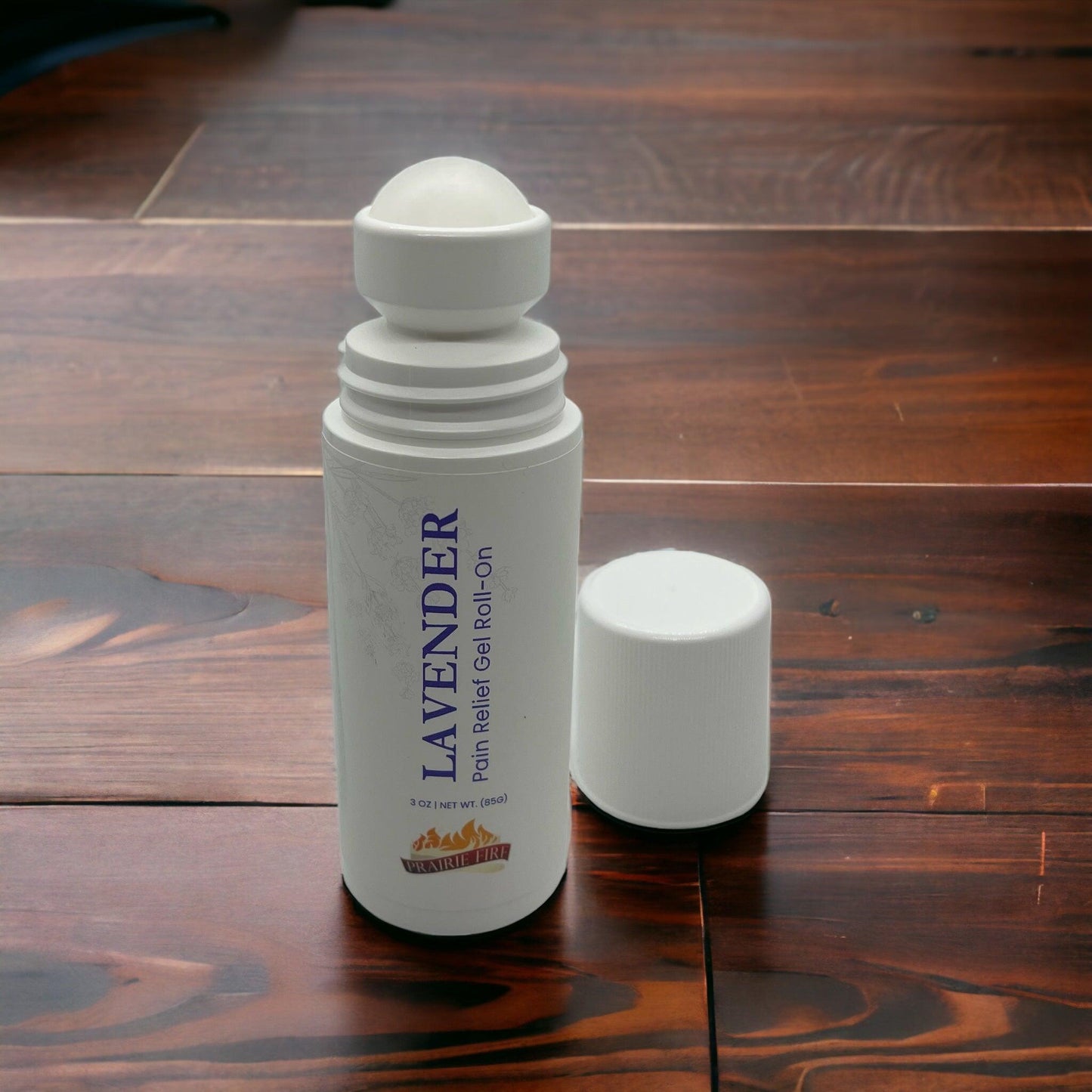 Lavender & menthol soothe pain gel roll-on by Prairie Fire Lavender Farm, 3 oz., with a clear roll-on applicator and lavender packaging