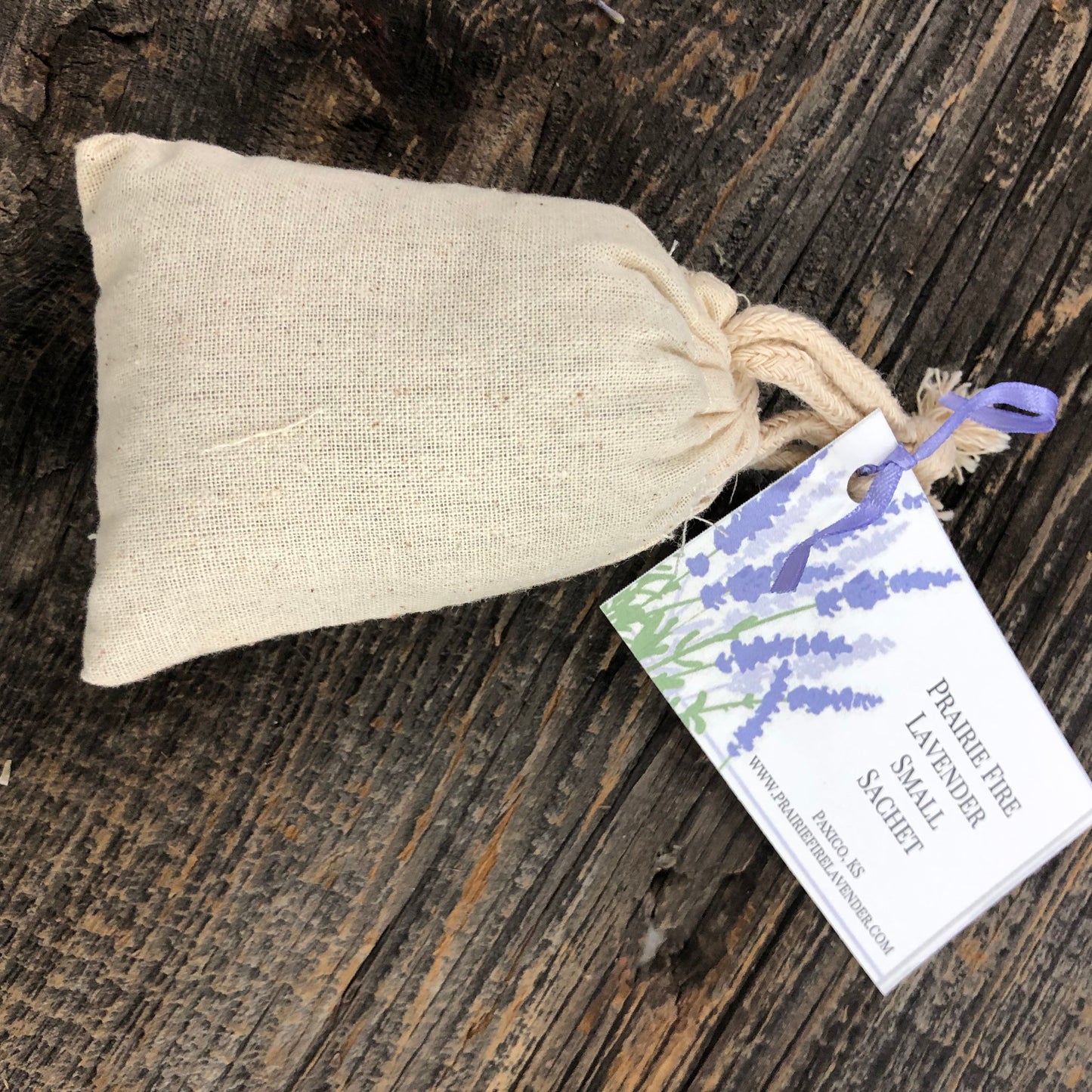Small lavender sachet from Prairie Fire Tallow with Provence lavender, featuring a soft fabric pouch and fresh lavender sprigs.