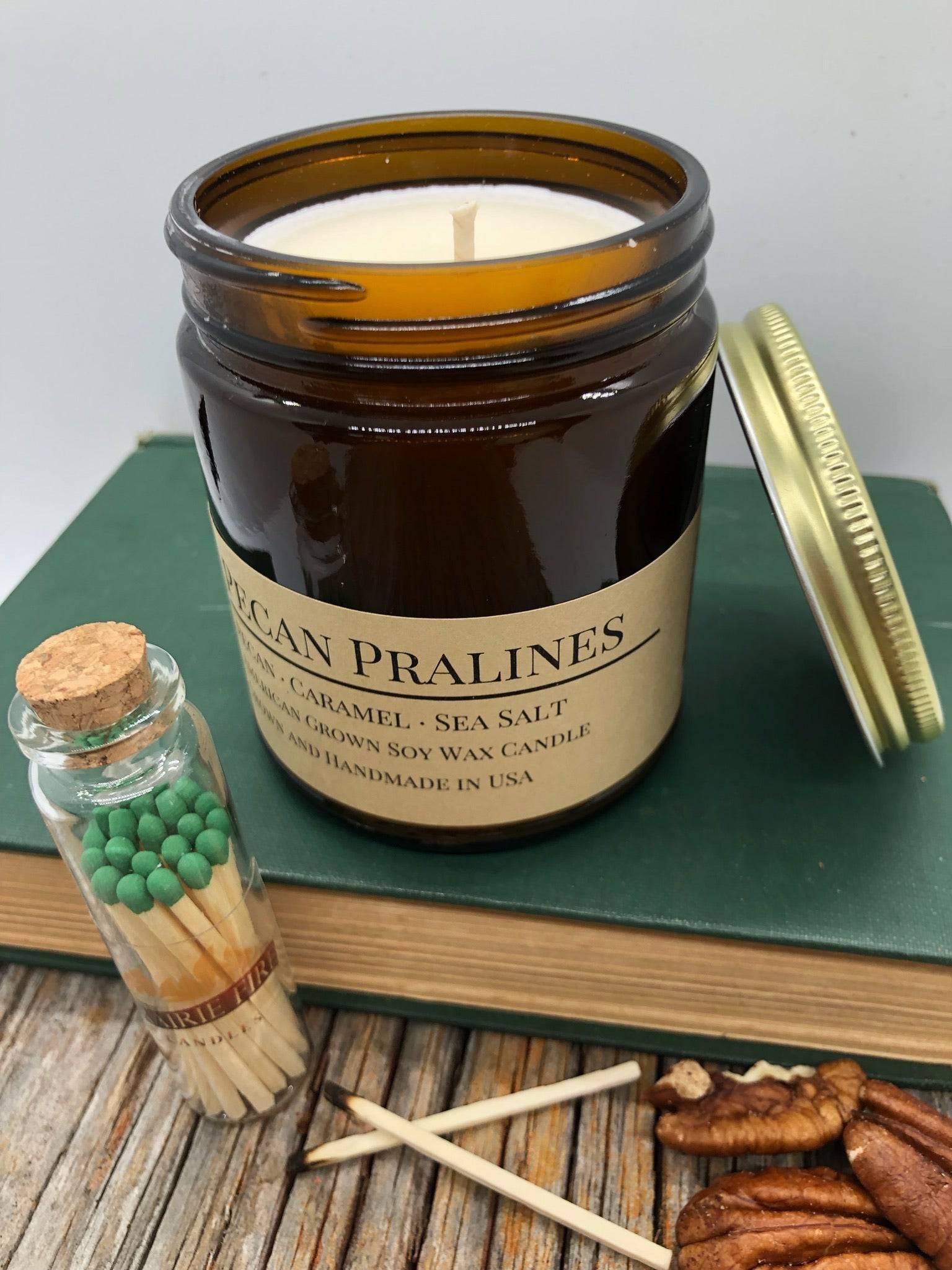 Pecan Pralines soy wax candle in a 9 oz amber apothecary jar by Prairie Fire Tallow, Candles, and Lavender.
