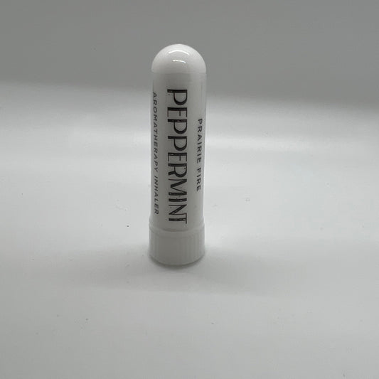 Peppermint aromatherapy inhaler from Prairie Fire Tallow featuring a sleek portable container for refreshing mint scent.