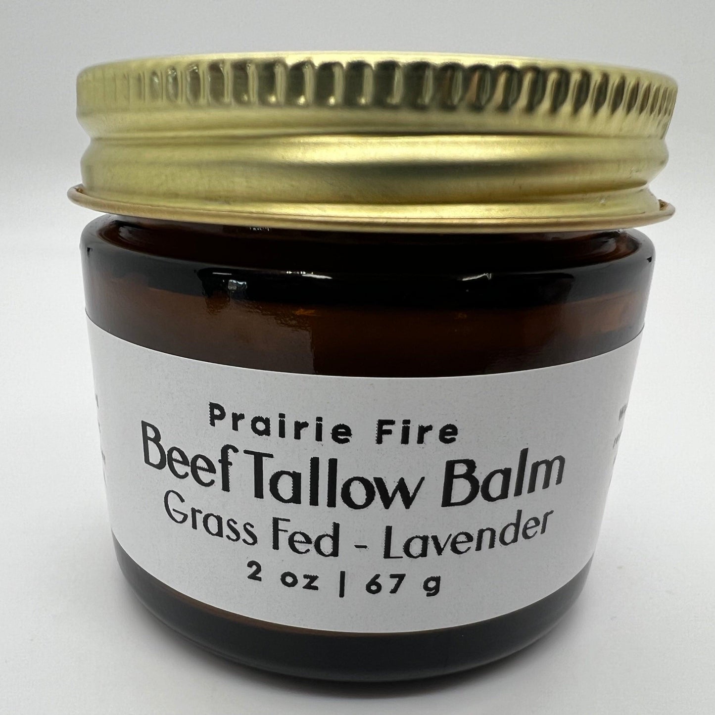 Organic beef tallow balm from Prairie Fire, 2 oz, moisturizing skin care lotion made with grass-fed, finished tallow, fragrance-free.