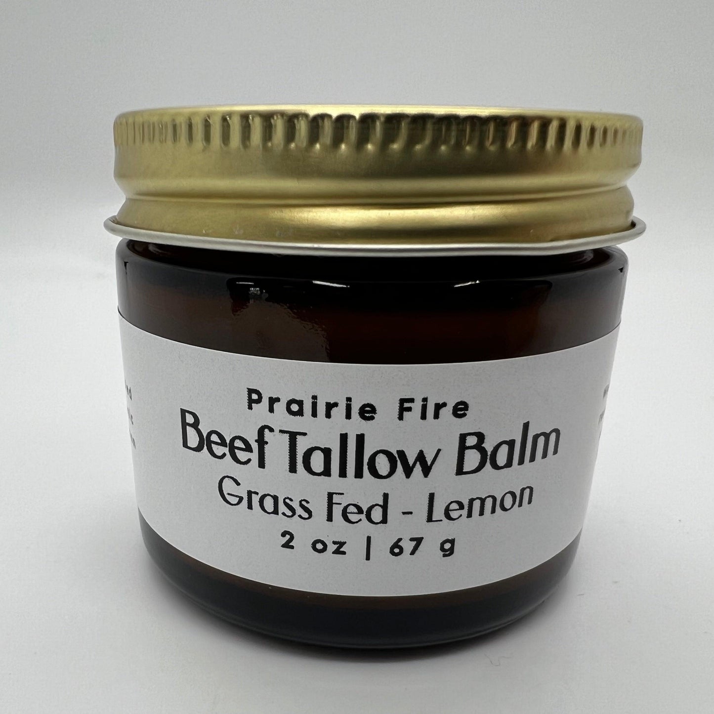 Prairie Fire Tallow Beef Tallow Balm 2 oz, organic grass-fed moisturizer, fragrance-free skin care in a small jar.