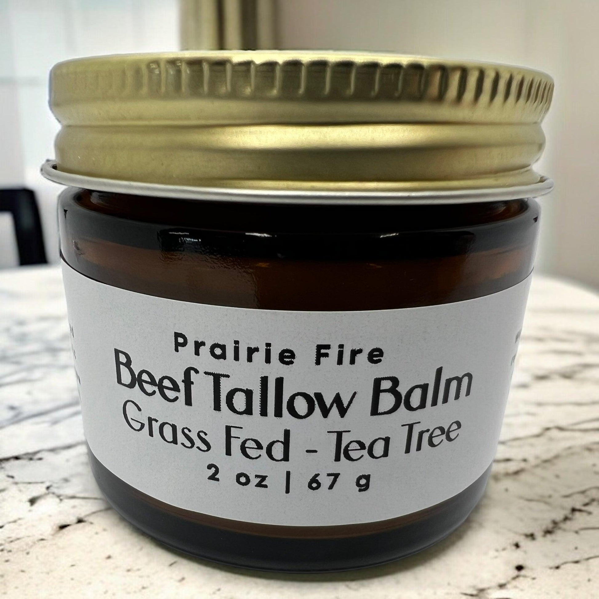 Prairie Fire Tallow Beef Tallow Balm 2 oz, organic grass-fed moisturizer, fragrance-free skin care lotion, made in USA.