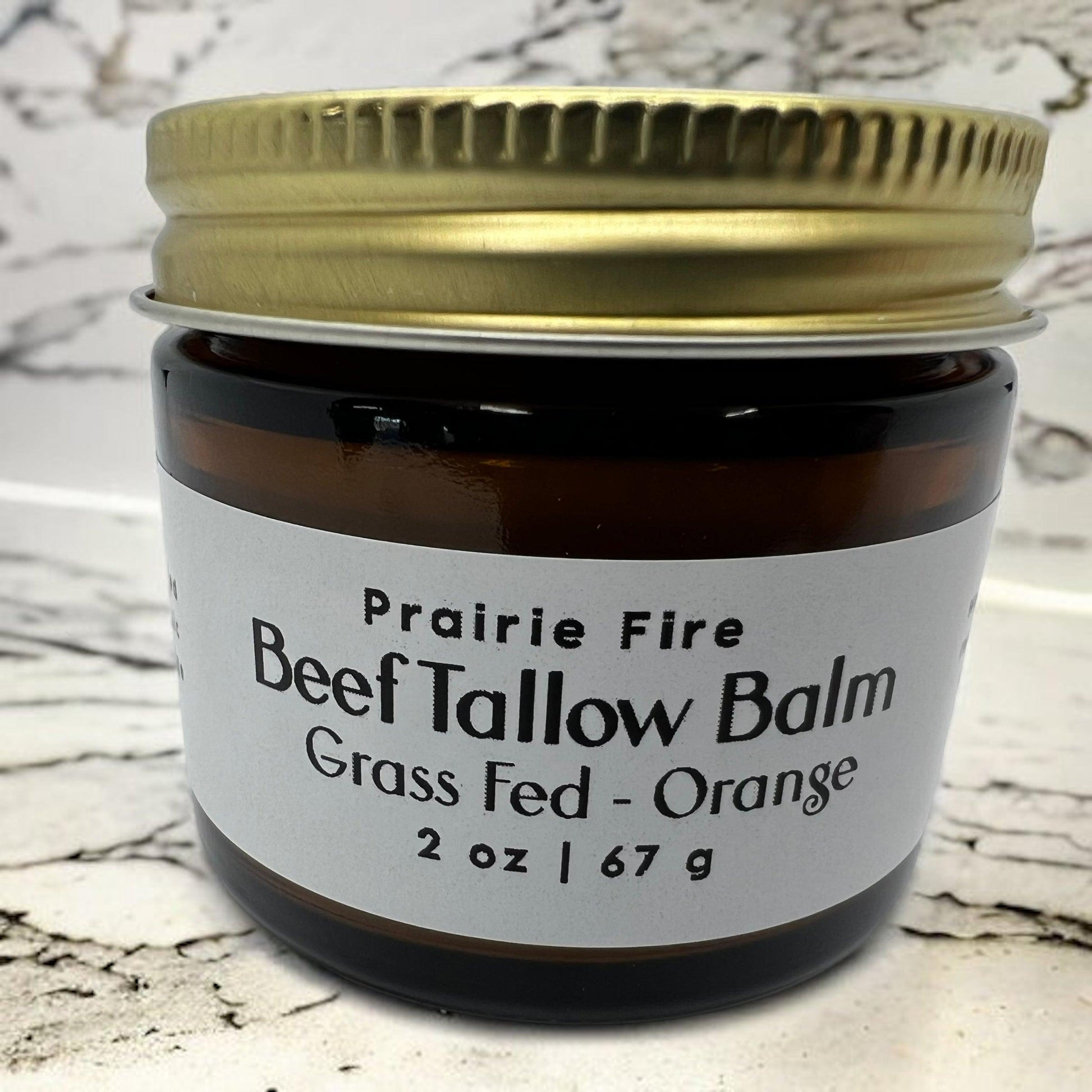 Prairie Fire Tallow Beef Tallow Balm in 2 oz jar, organic grass-fed, fragrance-free moisturizer for healthy skin.