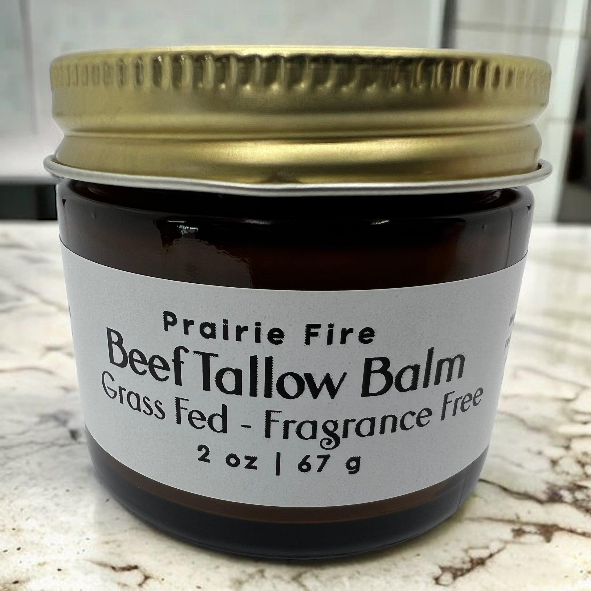 Organic beef tallow balm by Prairie Fire Tallow, 2 oz, moisturizing skincare made in the USA with grass-fed, finished tallow.