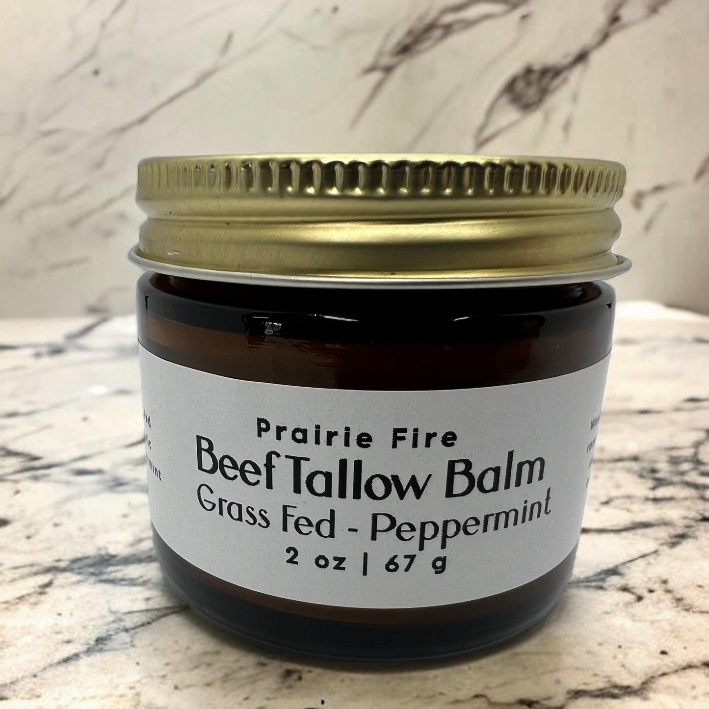 Prairie Fire Tallow Beef Tallow Balm in 2 oz jar, organic grass-fed, fragrance-free moisturizer for nourishing skin care.