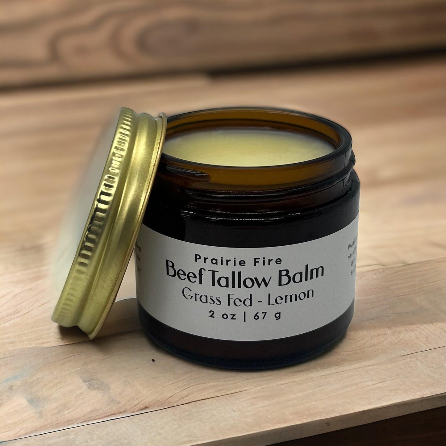 Prairie Fire Tallow Moisturizing Balm in 2 oz jar, made with organic grass-fed beef tallow, natural skin care, fragrance-free.