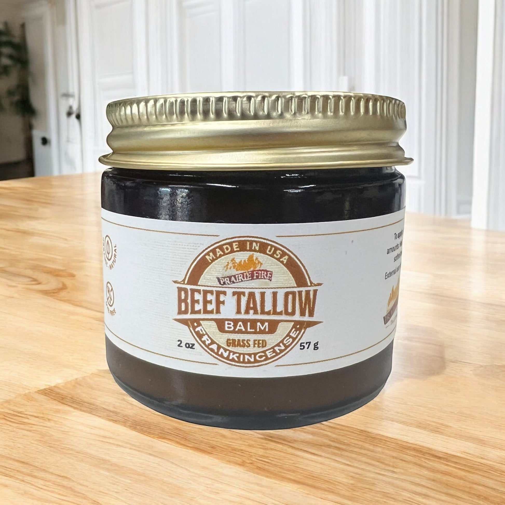 Prairie Fire Tallow Beef Tallow Balm in 2 oz jar, organic grass-fed, fragrance-free moisturizer for nourishing skin care.