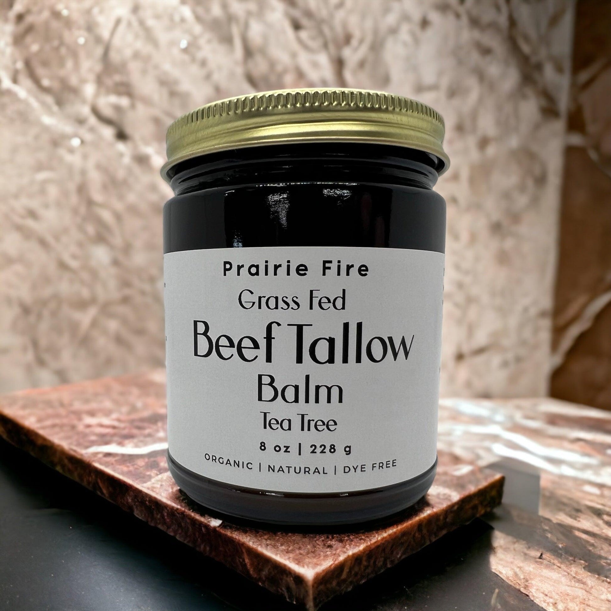 Organic beef tallow balm in an 8 oz jar by Prairie Fire Tallow, moisturizing skin care made in the USA from grass-fed beef.