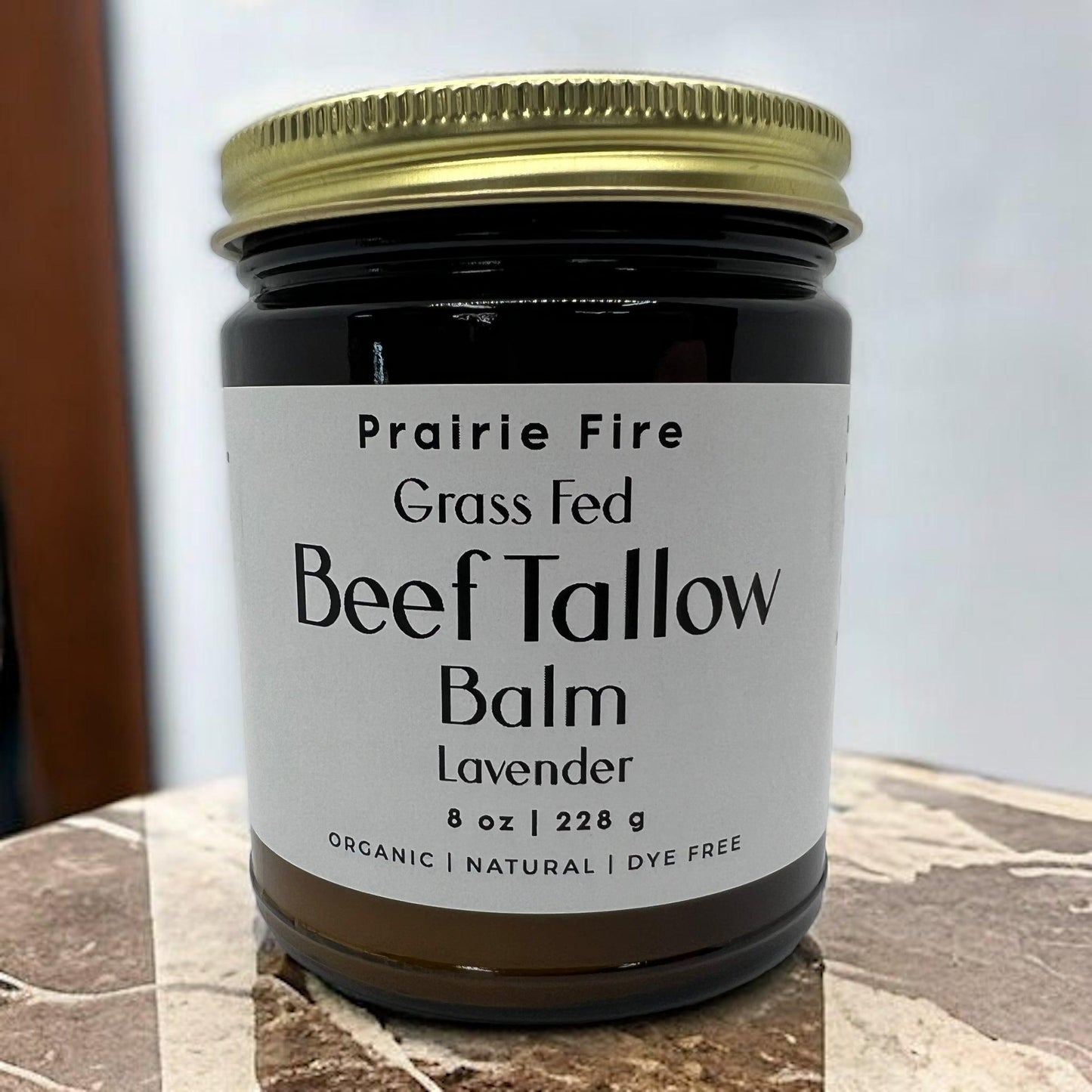 Organic beef tallow balm in a 8 oz jar by Prairie Fire Tallow, moisturizing skincare made from grass-fed, finished beef fat.