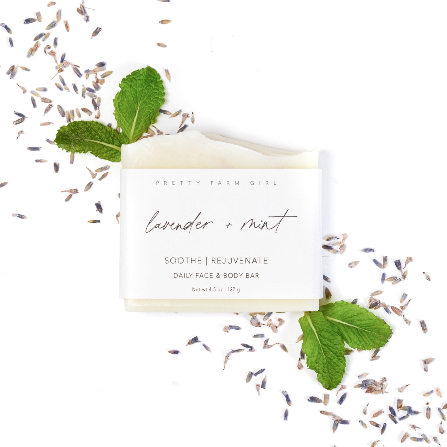 Lavender and mint handmade tallow and goat milk soap bar by Pretty Farm Girl, showcasing a natural soap with lavender and mint accents.