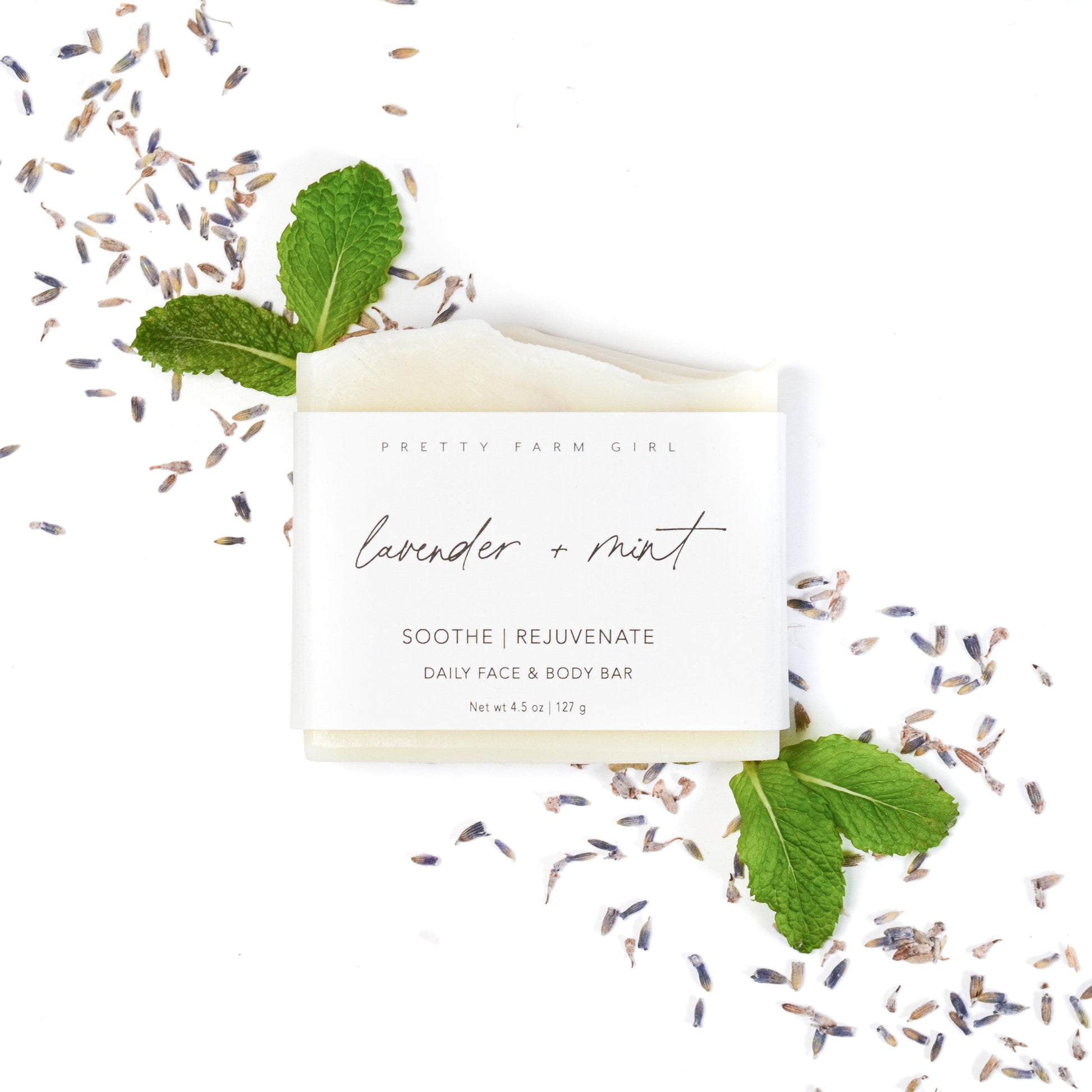 Lavender and mint handmade tallow and goat milk soap bar by Pretty Farm Girl, showcasing a natural soap with lavender and mint accents.