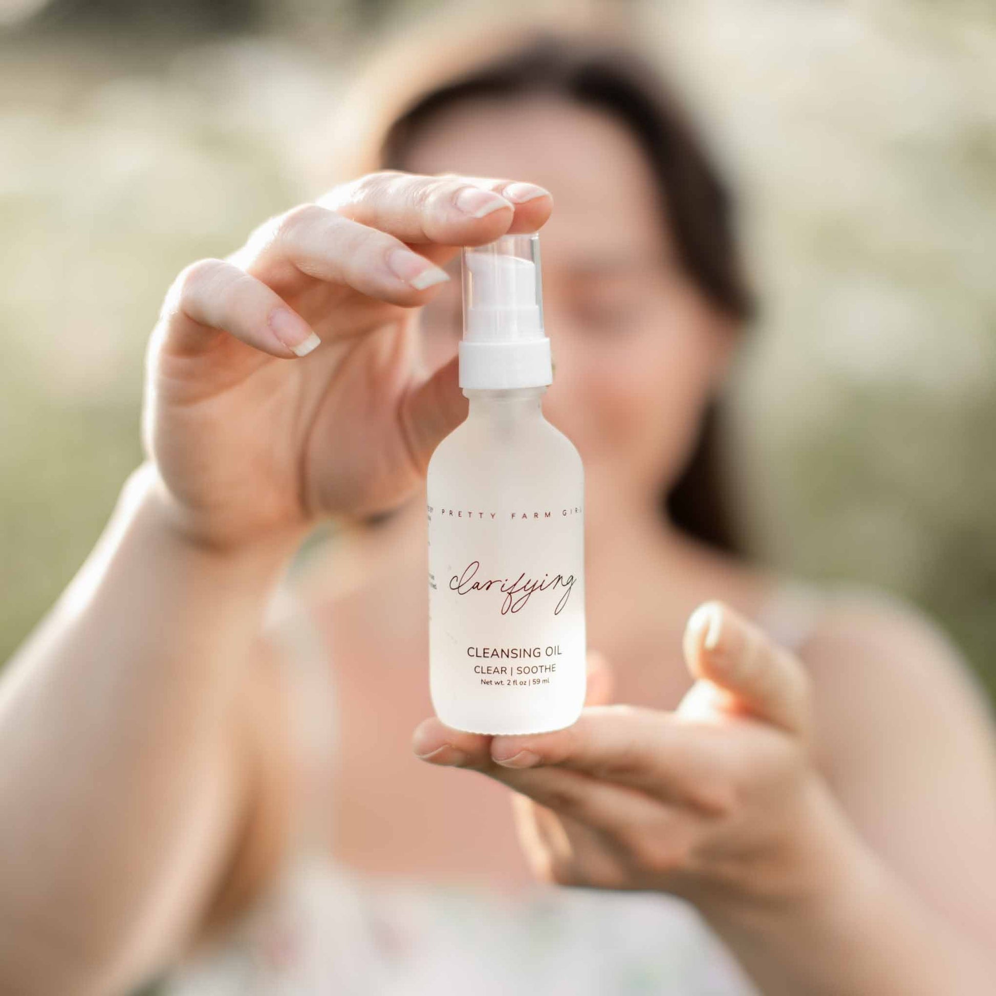 Pretty Farm Girl Clarifying Cleansing Oil for acne-prone skin, a gentle face cleanser with natural ingredients.