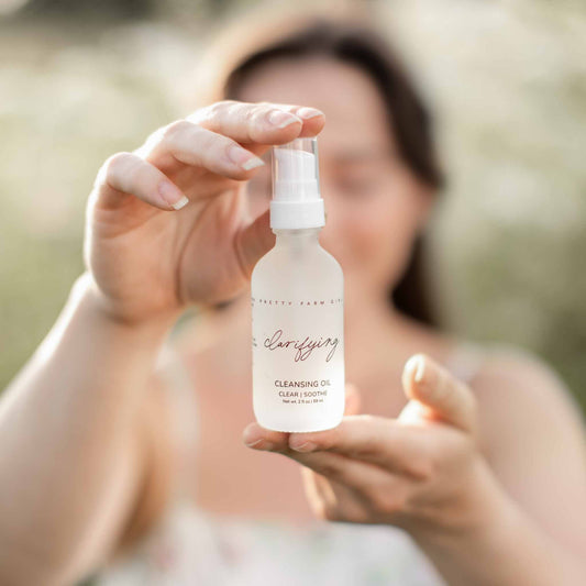 Pretty Farm Girl Clarifying Cleansing Oil for acne-prone skin, a gentle face cleanser with natural ingredients.