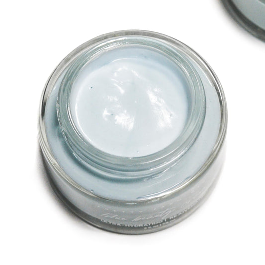 Blue Beauty Cream soothing tallow face cream by Pretty Farm Girl, shown in a jar with a smooth, creamy texture.