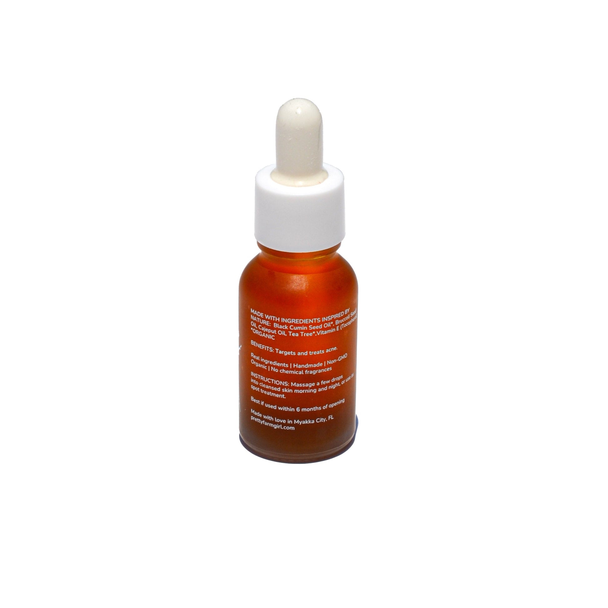 Pretty Farm Girl clarifying face serum for acne-prone skin, featuring a clear bottle with dropper applicator.