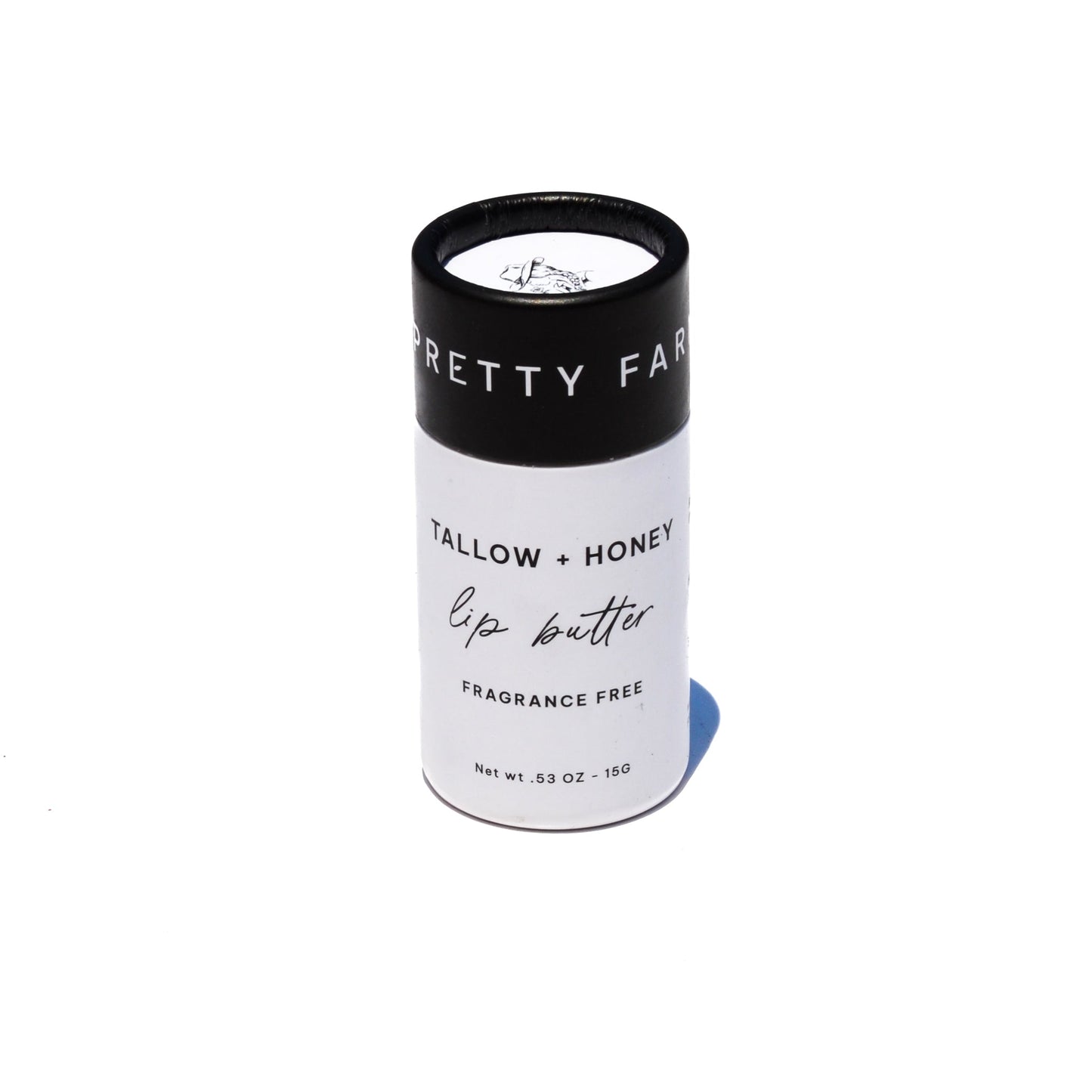 Fragrance-free tallow and honey lip butter in eco-friendly travel tube, natural ingredients, creamy texture, and minimalist design.
