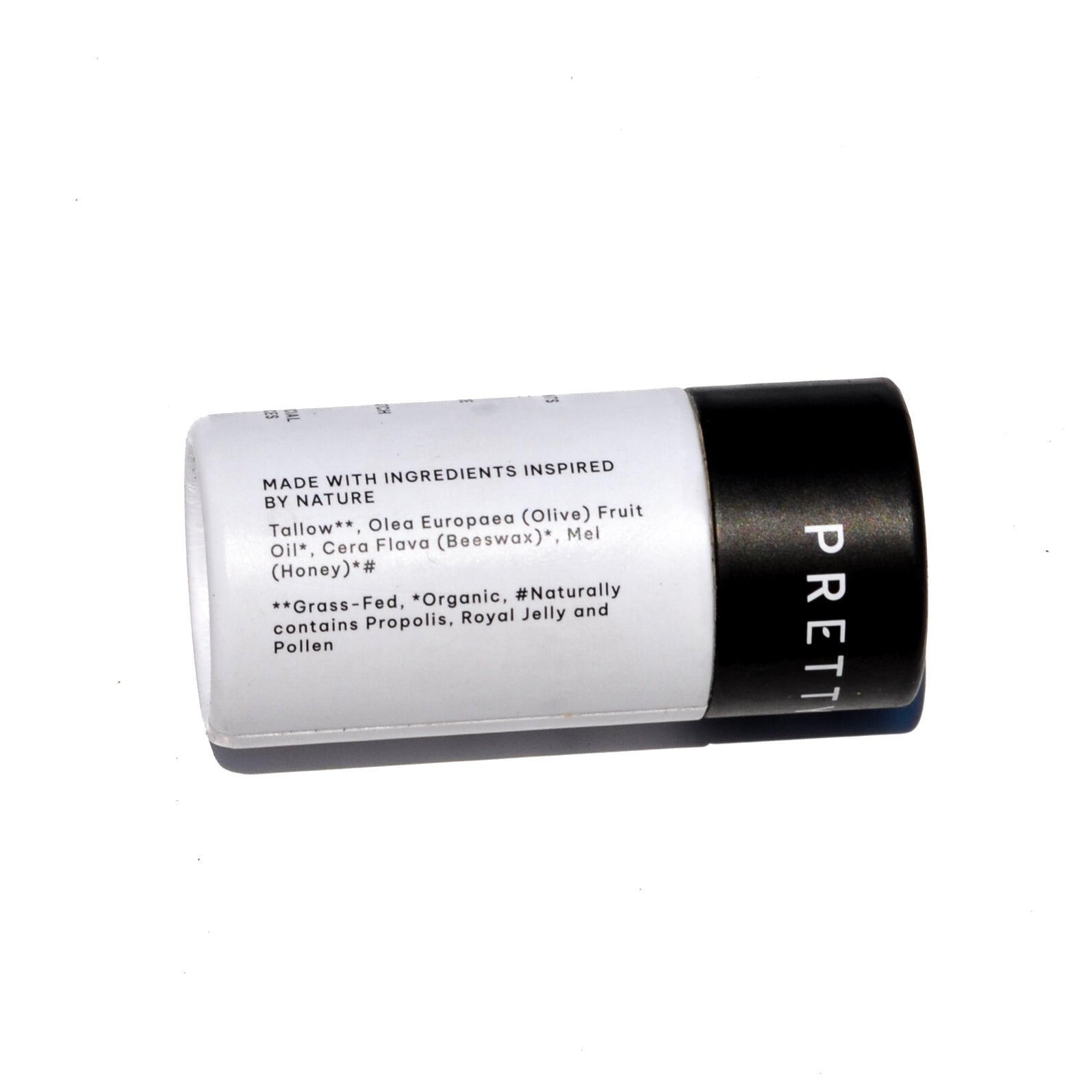 Fragrance-free tallow and honey lip butter by Pretty Farm Girl in eco-friendly travel tube, showcasing smooth, natural lip balm.