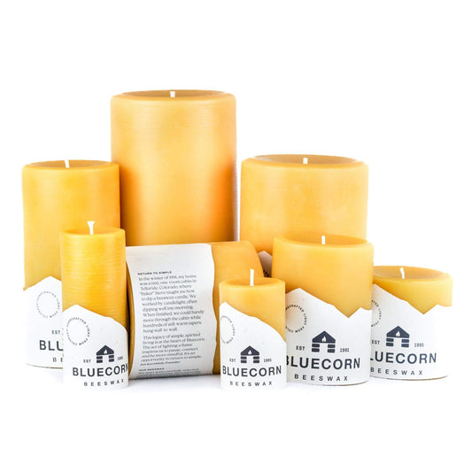 Set of Bluecorn Candles pure beeswax pillar candles with natural yellow color and smooth, cylindrical shape for home decor.
