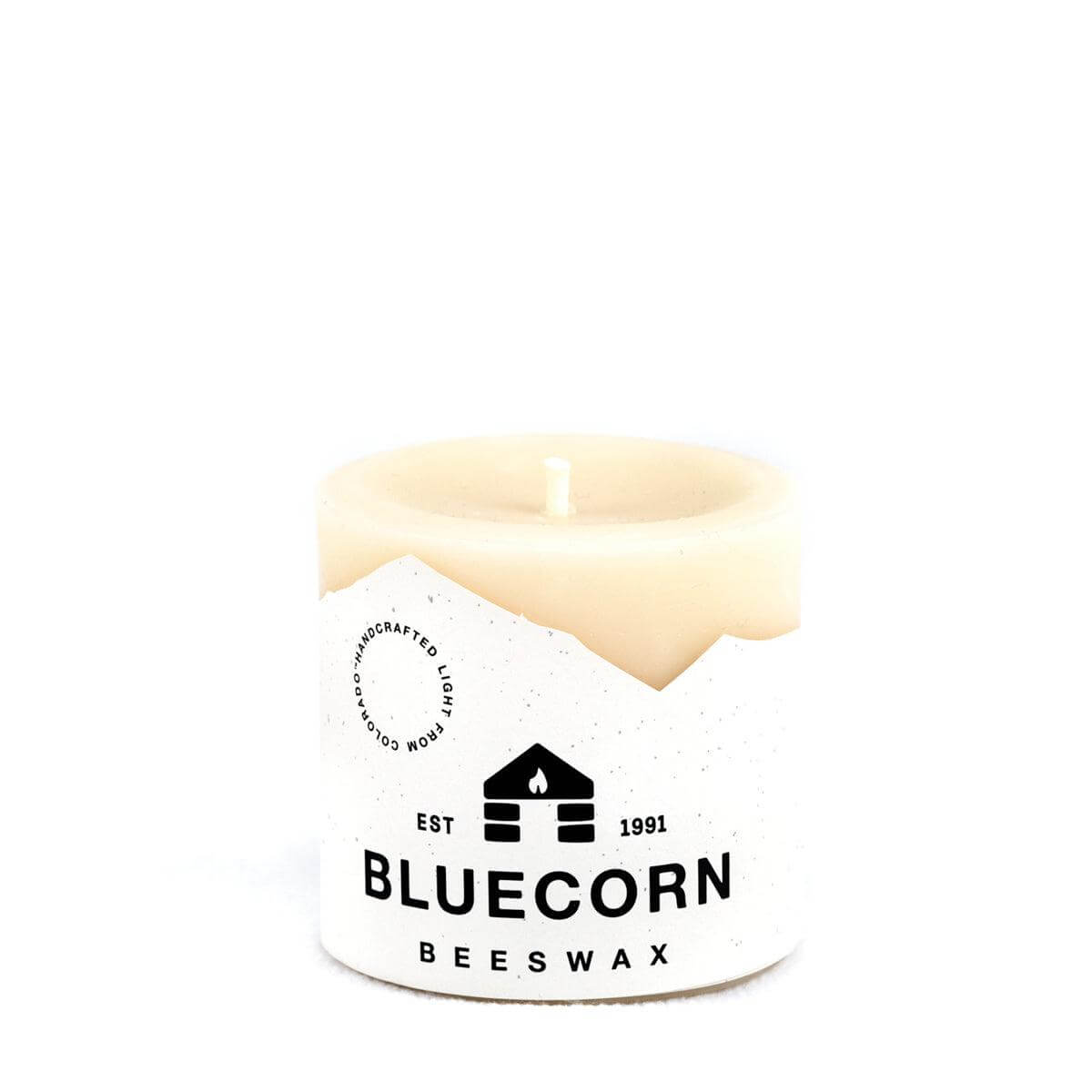 Ivory pure beeswax pillar candles from Bluecorn Candles, showcasing tall, smooth, natural beeswax finish with a clean, elegant look.