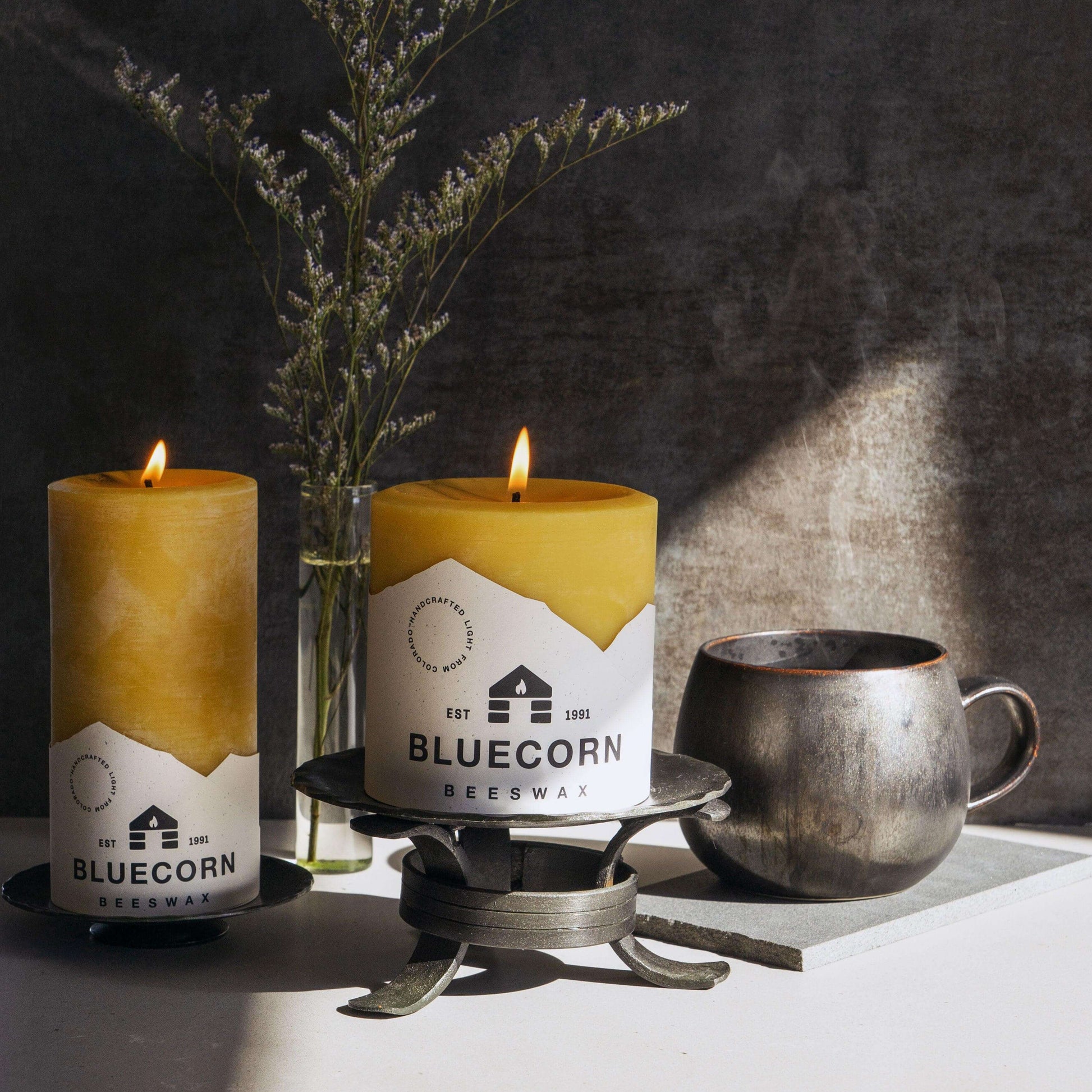 Bluecorn Candles pure beeswax pillar candles, natural yellow-colored candles with smooth wax finish, ideal for home décor and ambiance.