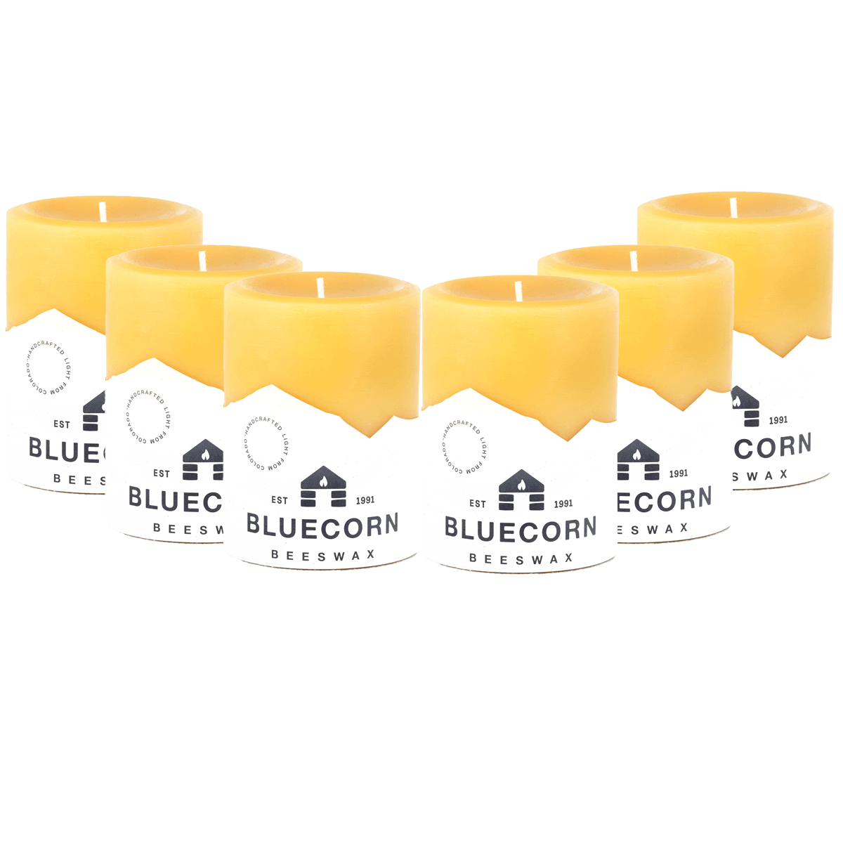 Set of three Bluecorn Candles pure beeswax pillar candles in natural yellow with unlit wicks, showcasing smooth cylindrical design.