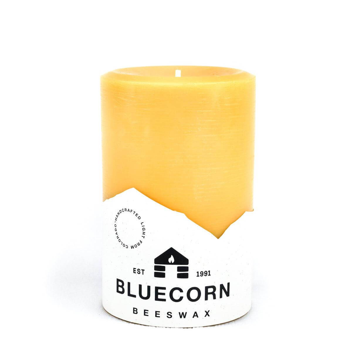 Set of Bluecorn Candles pure beeswax pillar candles with natural creamy color and simple, elegant design.