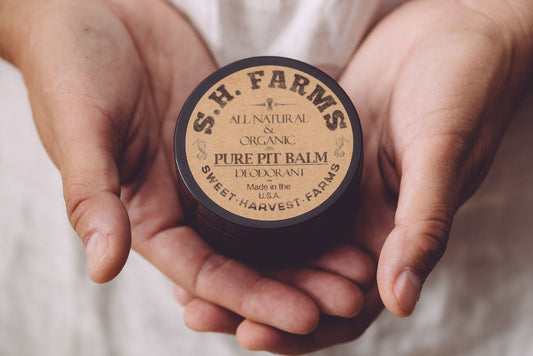 Organic Pure Pit Balm deodorant by Sweet Harvest Farms, aluminum-free natural deodorant in a balm form with a clean, eco-friendly packaging.