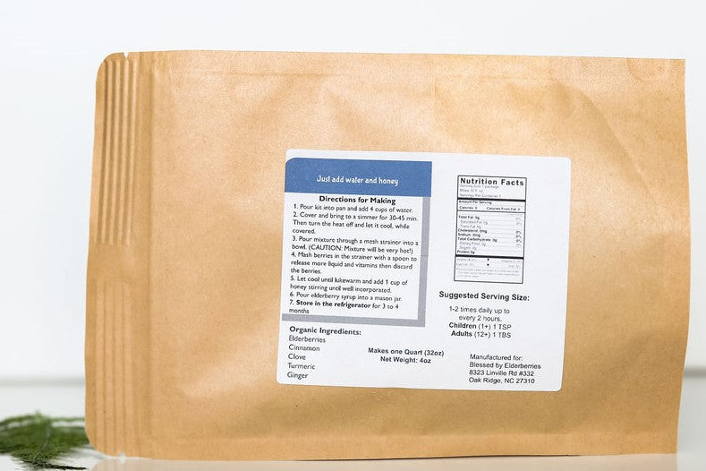 All-natural quart-sized elderberry syrup DIY kit by Blessed by Elderberries, featuring ingredients and tools for homemade elderberry tea.