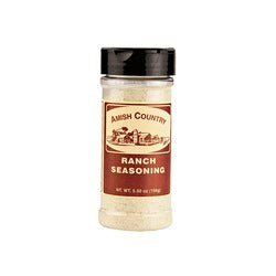 Amish Country Store Ranch Popcorn Seasoning on Amish popcorn, featuring a container of savory ranch flavor.
