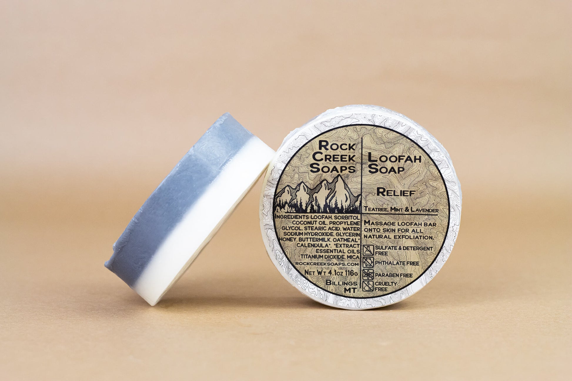 Rock Creek Soaps Relief Loofah Soap with exfoliating loofah embedded in a creamy soap bar for gentle cleansing and skin renewal.