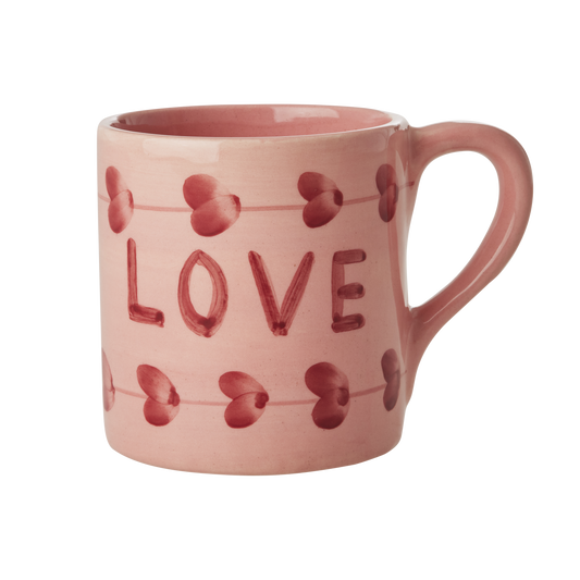 Ceramic mug with hand-painted love design, 14.2 oz capacity, from Rice By Rice, shown with a colorful, artistic pattern.