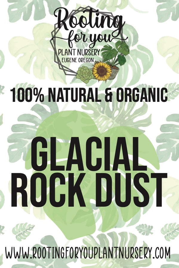 Gray glacial rock dust soil amendment from Rooting For You Plant Nursery, showing a pile of mineral-rich rock dust for gardening.