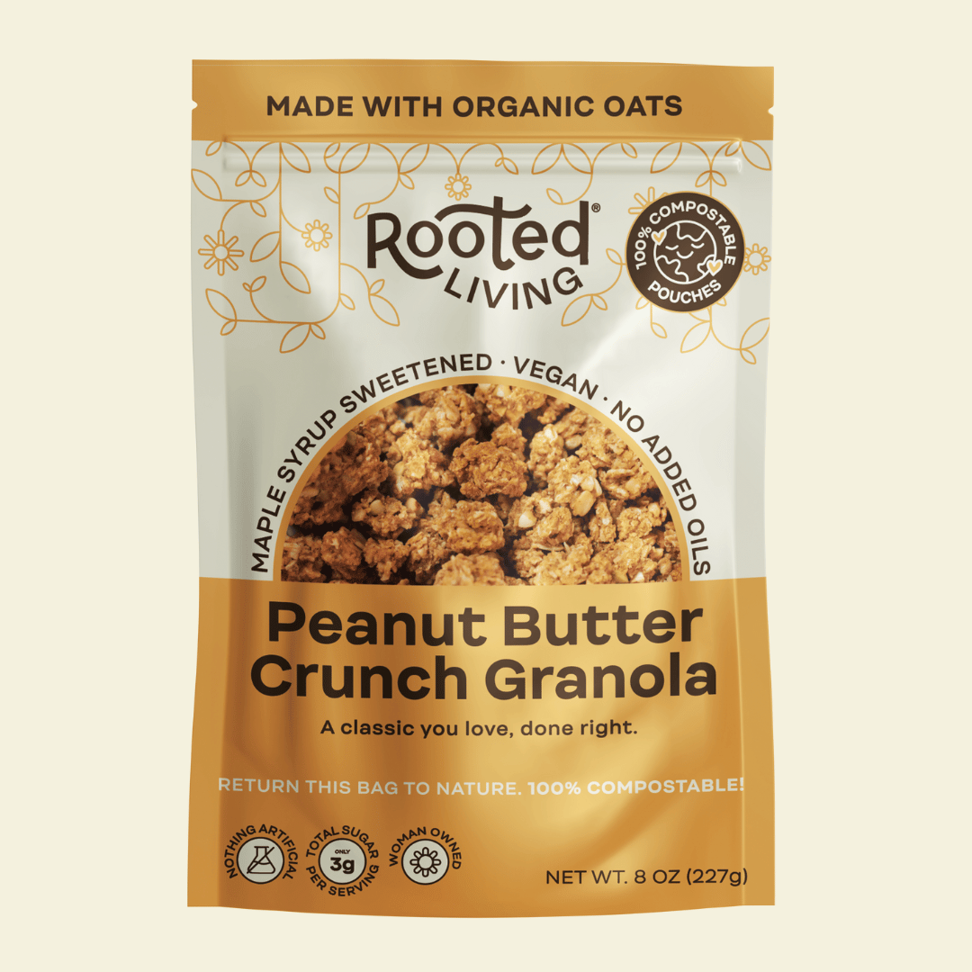 Canned peanut butter crunch granola from Rooted Living in a sealed metal can with a label showing granola close-up.