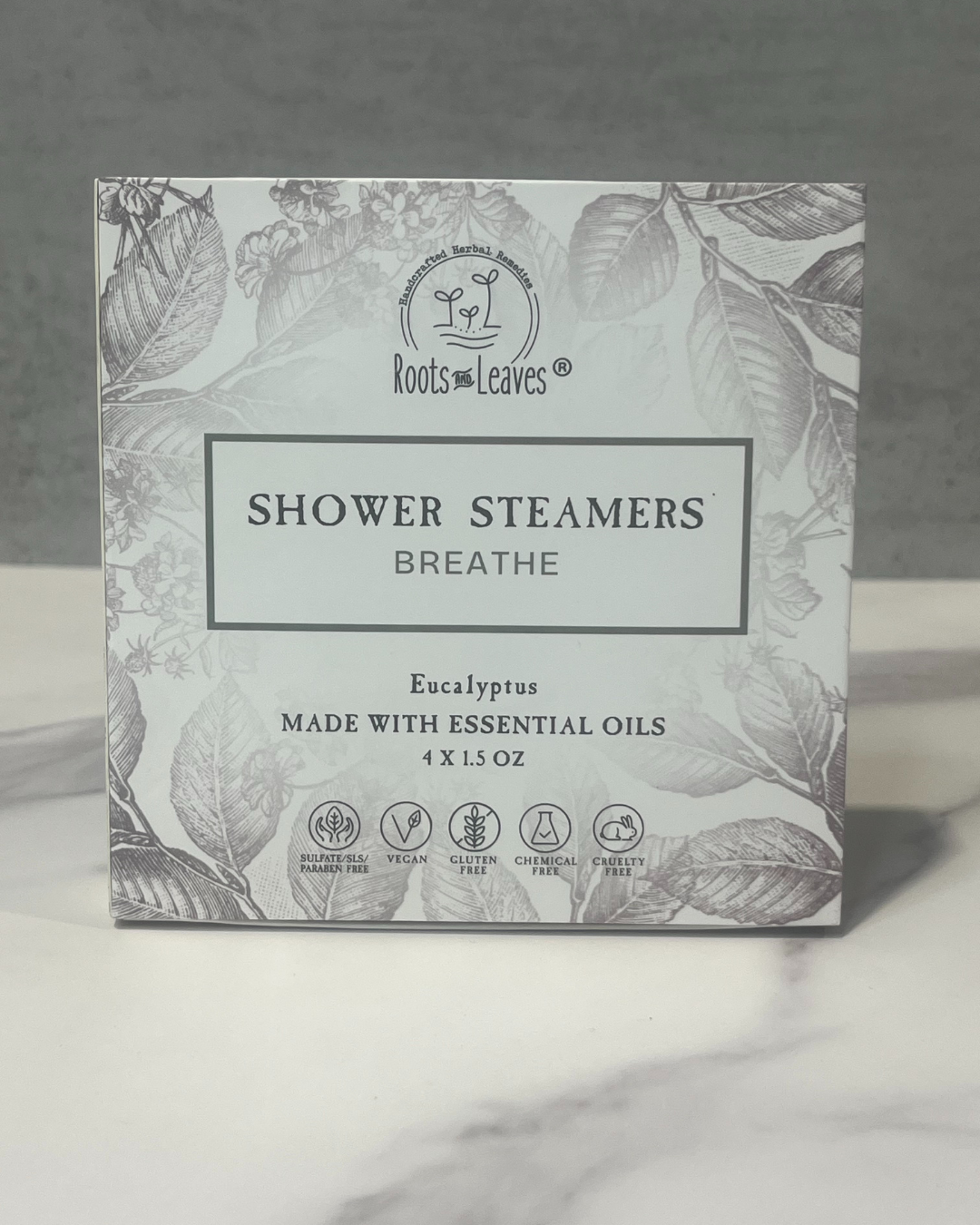 Eucalyptus shower steamer and bath bomb from Roots and Leaves LLC, featuring fresh eucalyptus scent and natural ingredients.